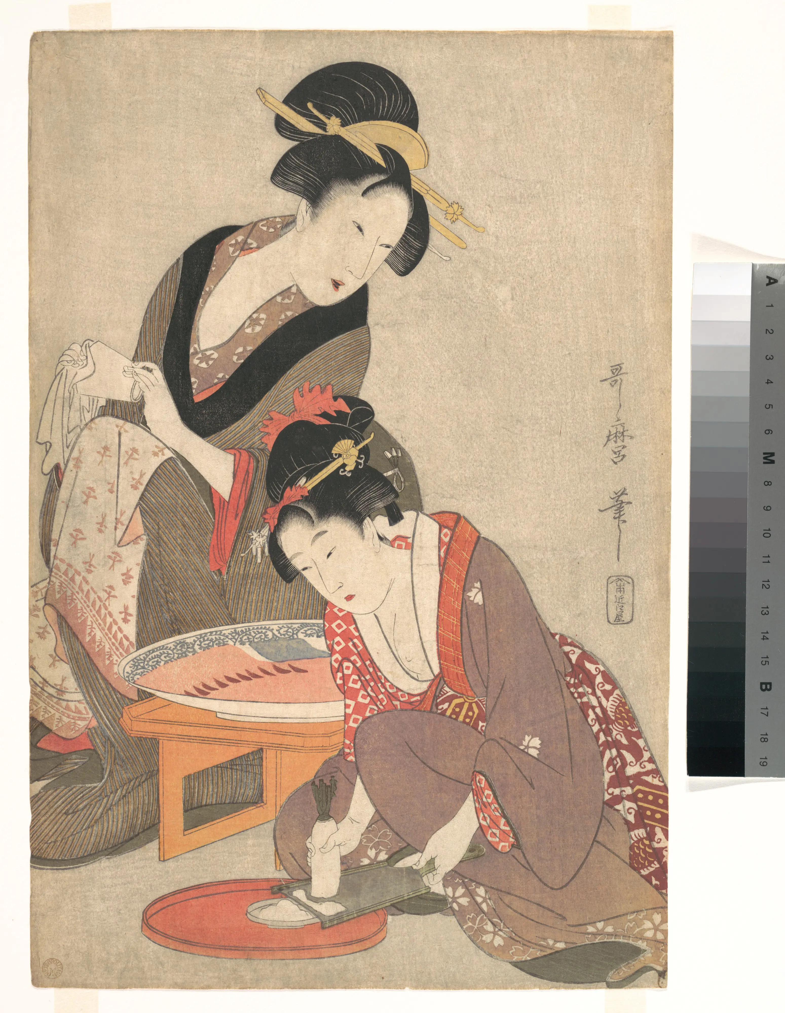 准备生鱼片的女子